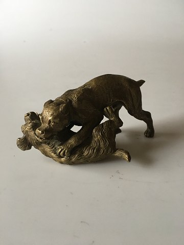 Bronze figurine of two dogs fighting. Top quality and signed
