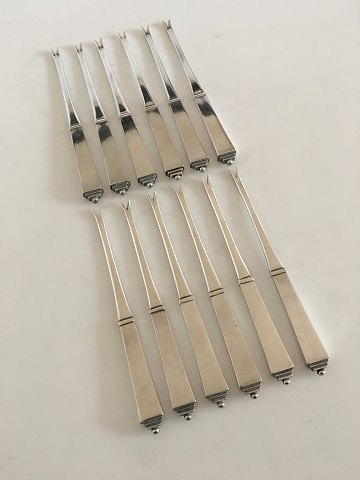 Georg Jensen Sterling Sølv Pyramide sæt af 12 x Hummergafler. Med Vintage GJ 
Stempler