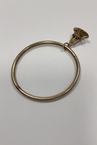 Armring i Forgyldt metal med vedhæng