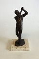 Royal Copenhagen Bronzestatuette af Golfspiller. Designet af Sterett-Gittings 
Kelsey i 1977