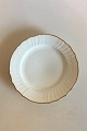 Royal Copenhagen Hvid Svejfet med takket guldkant(Stel 387/ Josephine) 
Frokosttallerken No 1623