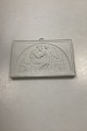 Royal Copenhagen Kgl. Porcelæn Biscuit Platte Amor optages hos Anacreon 
(Vinteren) No 65