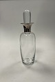 Holmegaard Karaffel i klart glas med sølv hals