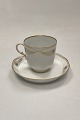 Royal Copenhagen Stel No. 118/2005 Kaffekop med Underkop Påfugl med Guldkant